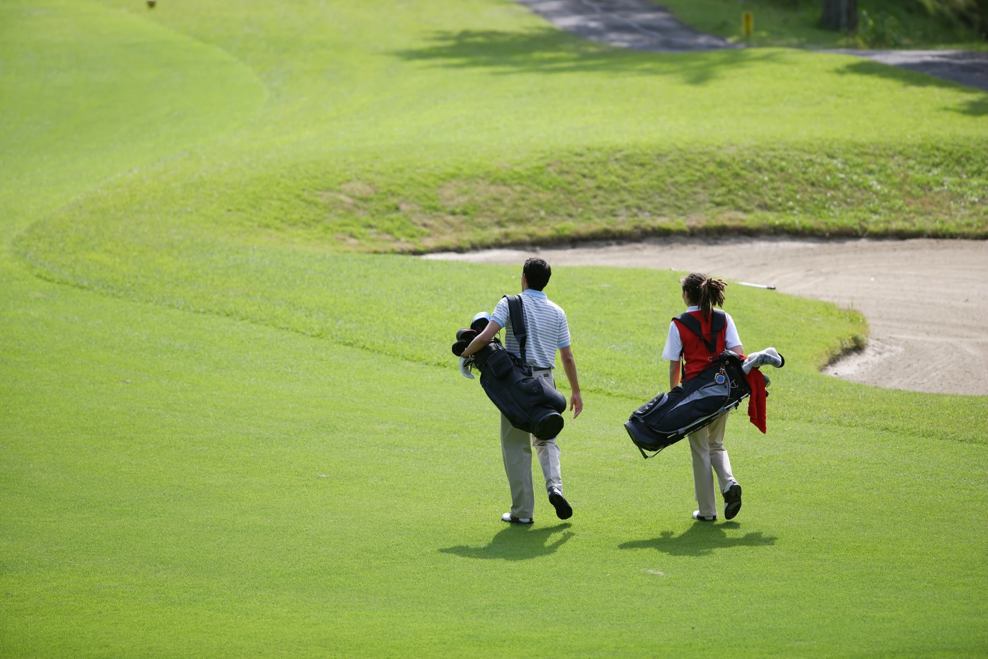 Golfistas en el campo — origen de The Fairway Network